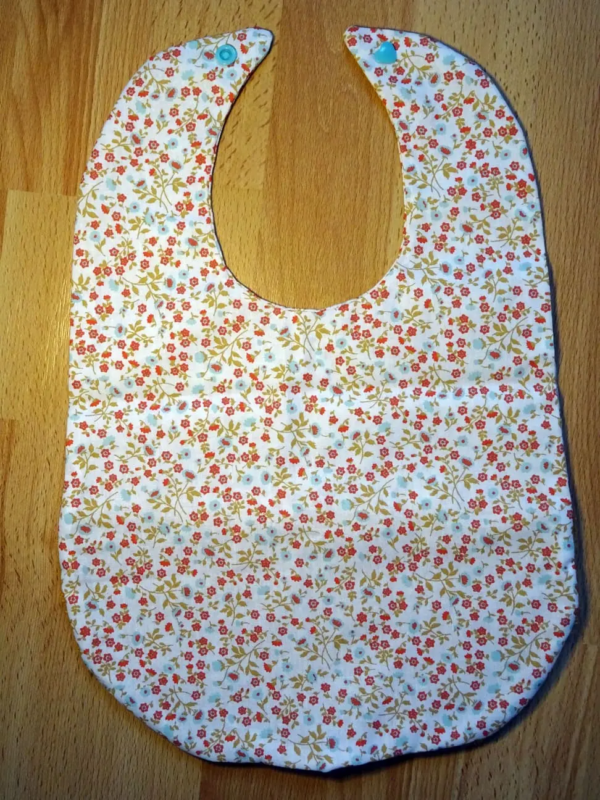 Bavoir fleurie orange et jaune cadeau de naissance 3